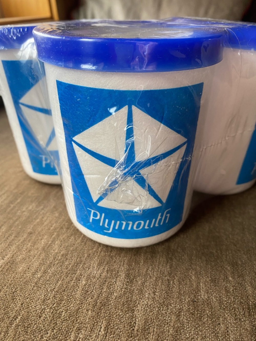 Plymouth Logo Can Koozie - White Body with Blue Logo
